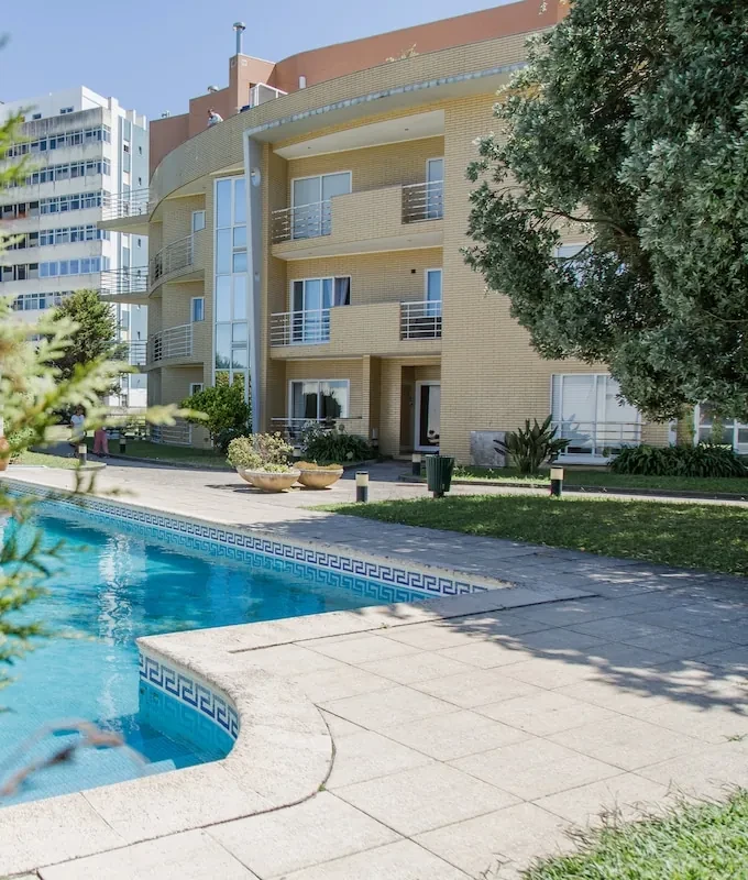 Shared swimming pool and garden at NorteSoul Miramar